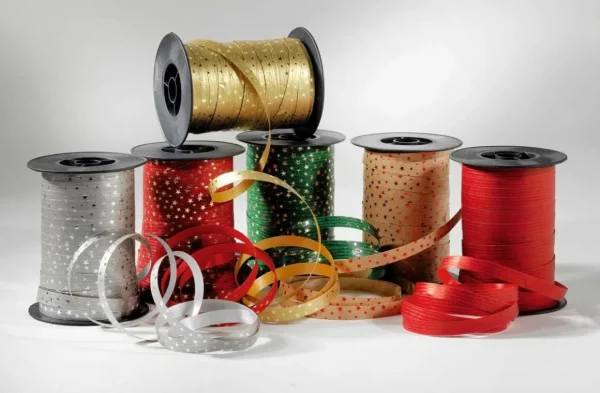 Geschenkband^DecoWoerner Poly-Ringelband "Sterne" 10 Mm, 100 M, rot